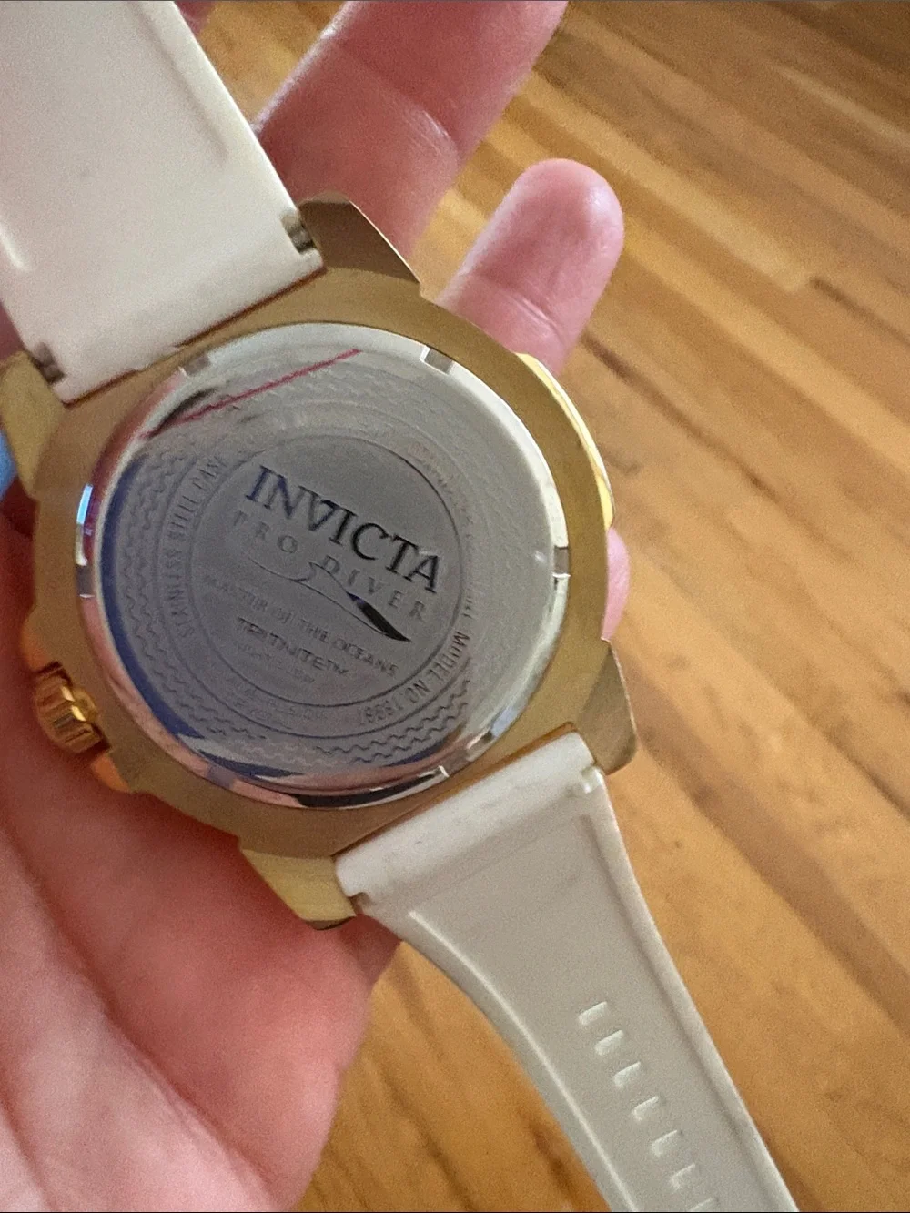 Invicta Gold and Black Chronograph Watch with White Strap